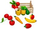 Drewniane owoce i warzywa w skrzynce