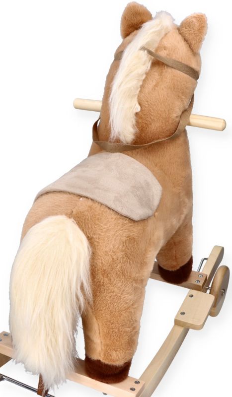 Konik na biegunach z marchewką