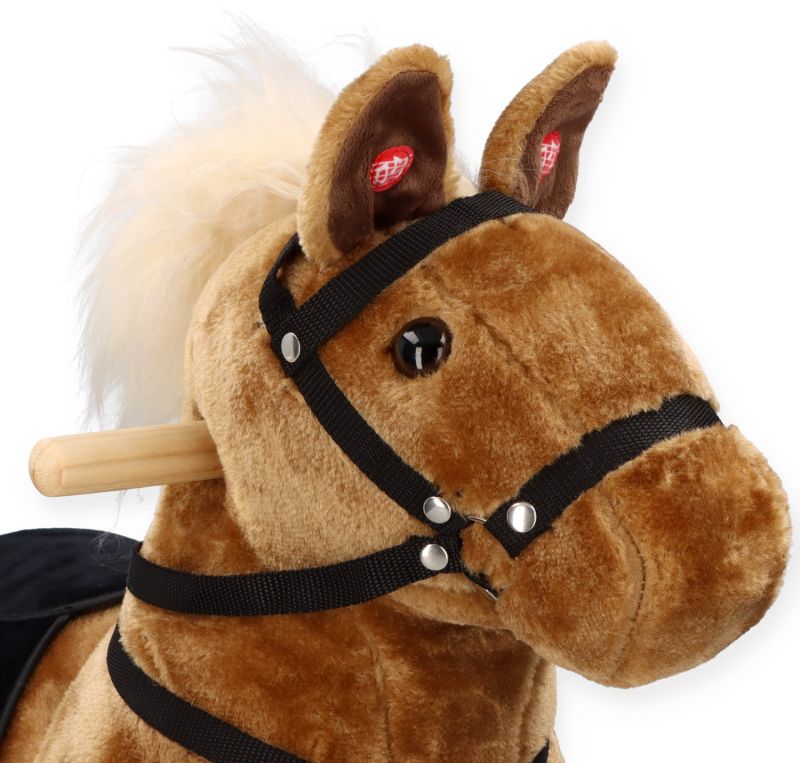 Brązowy konik na kółkach