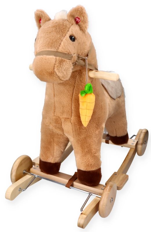 Konik na biegunach z marchewką