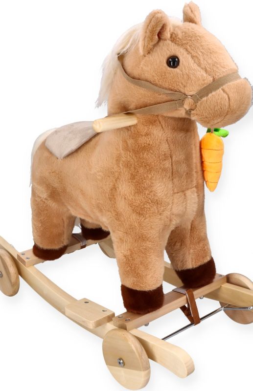 Konik na biegunach z marchewką